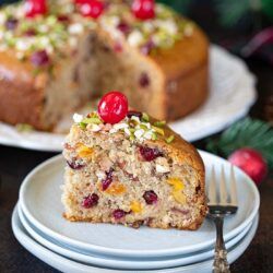 Slice piece of Spiced Fruit And Nut Cake on a plate